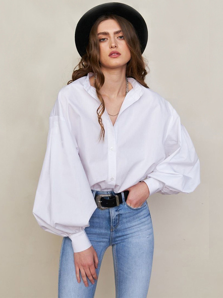 Image of Camicia da donna con bottoni bianchi  collo a punta  maniche lunghe casual