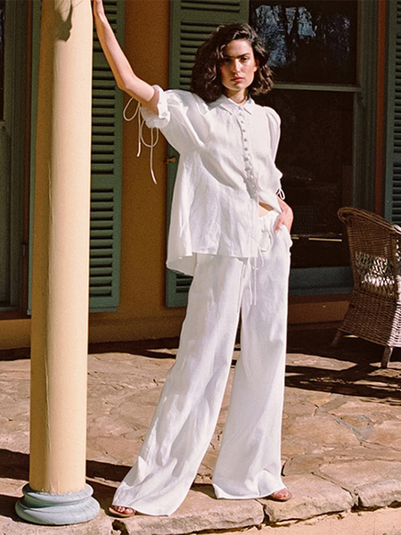 Image of Set di pantaloni bianco chic street wear con volant in cotone e lino