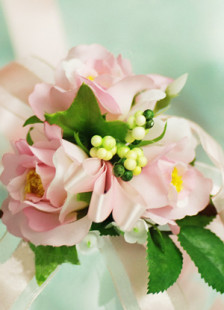 Fleurs de mariage petit bouquet au poignet en soie rose adorable