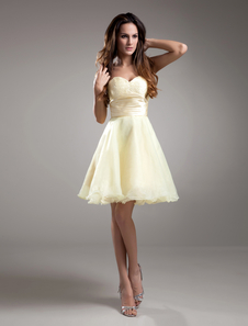 Robe fête de la rentrée jonquille de col en coeur avec perle