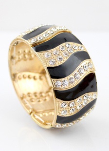 Bracelet métallique avec rayure et strass