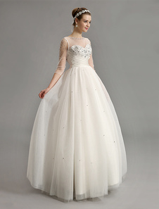 Robe de mariée en tulle ivoire avec paillettes à cou translucide