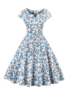 Robe vintage fabuleuse moderne à pois avec papillon décolleté cranté de fêtes