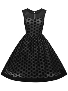 Robe vintage fabuleuse moderne noire à pois creusé col rond