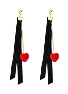 Frange de velours côtelé noir boucles d’oreilles avec des pompons rouges