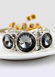 Bracelet métallique avec strass ronde