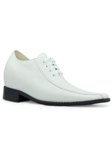 Chaussures ascenseur en peau de vache blanche