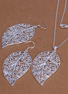 Fascinant ensemble bijoux en bronze argent de forme de feuille creusée