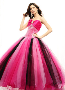Robe boule en tulle fuchsia avec paillettes encolure en coeur