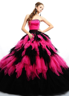 Robe boule en tulle fuchsia à volants bustier