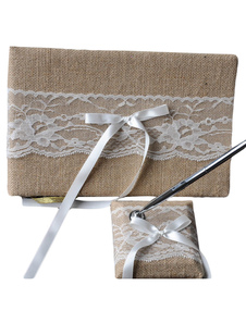 Livre et stylo de signe de mariage avec dentelle et nœud