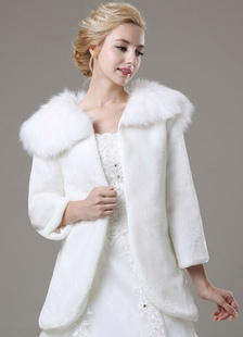 Boléro long à manche longue en fausse fourrure ivoire