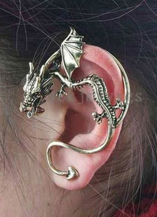 Boucle d'oreille métallique en forme de dragon