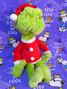 Le jouet en peluche synthétique Grinch vert