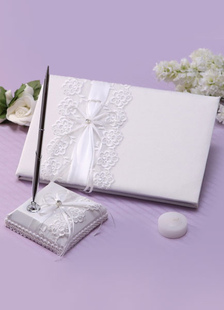 Dentelle Ivoire arcs stylos et livres de mariage