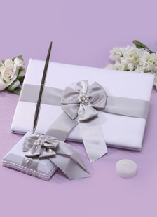 Gris perlé boucles mariage livres et stylos