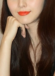 Maquillage rouge à lèvres orange