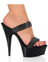 Mules sexy  plateformes cloutées en cuire verni noir aux talons hauts