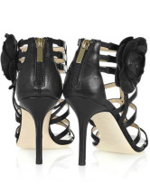 Sandales noires à talons hauts en peau de mouton 
