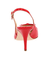 Chaussures rouges et pointues à talons hauts en peau de mouton 