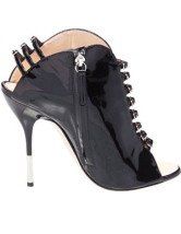 Sandales noires à talons hauts en cuir avec boutons et zip 