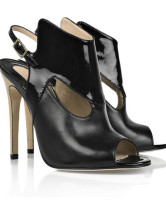 Sandales en noir à talons hauts en peau de mouton et PU