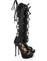 Chaussures noires de mode pour femmes en cuir verni aux talons hauts