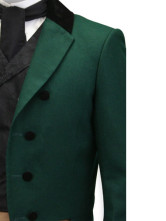 un beau manteau a queue vert foncee a double boutonnage du tissu jazz