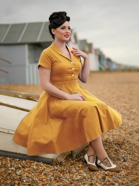 Image of Abito vintage colletto rovesciato bottoni anni &#39;50 stile Audrey Hepburn maniche corte abito Rockabilly giallo medio